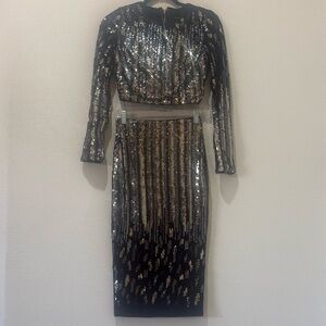 Marciano Black and Gold Sequin set top and skirt.